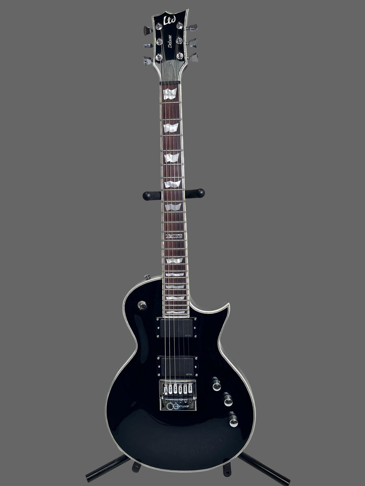 Used ESP LTD Deluxe w/evertune Bridge Black w Pearl Binding