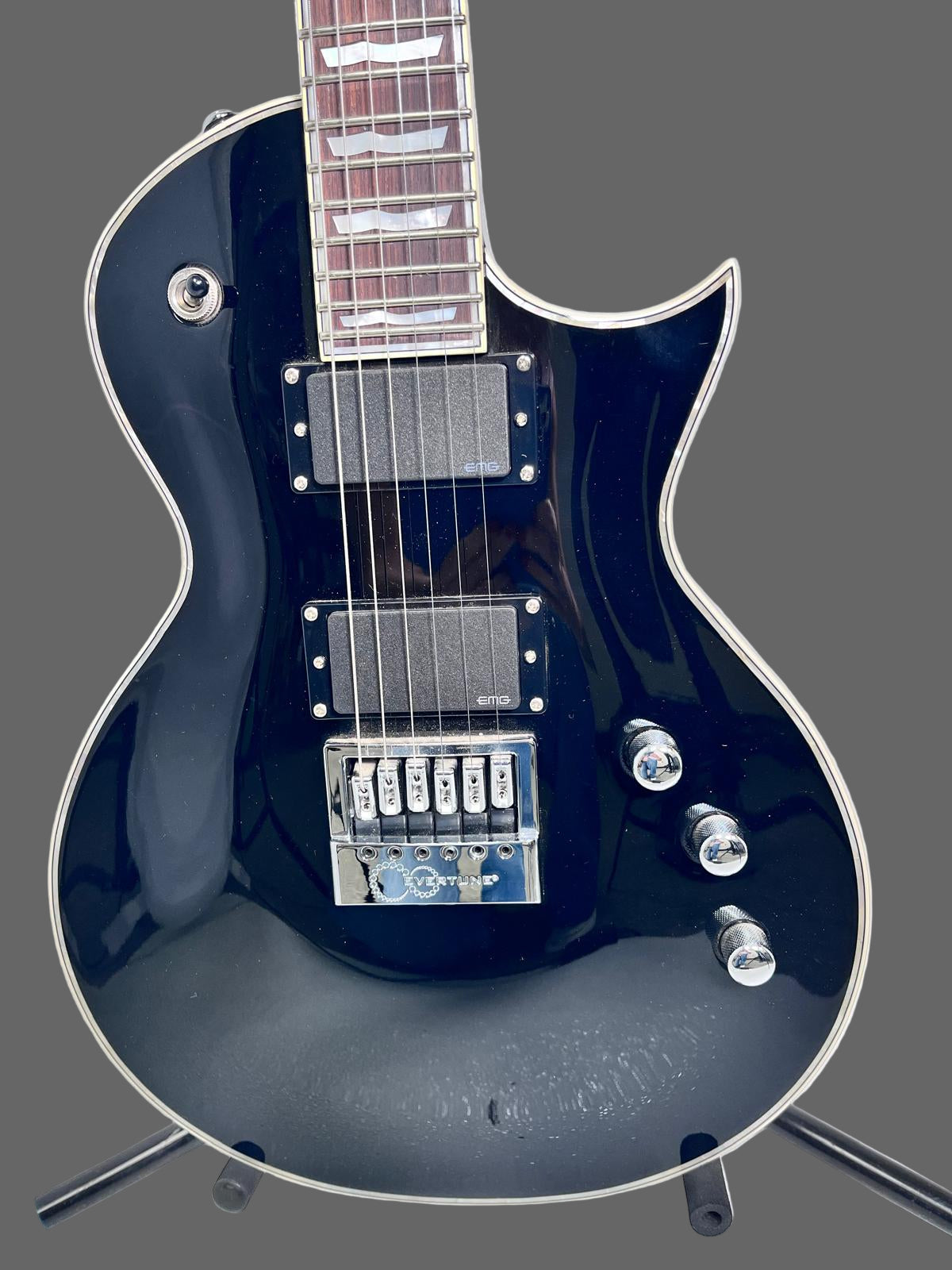 Used ESP LTD Deluxe w/evertune Bridge Black w Pearl Binding