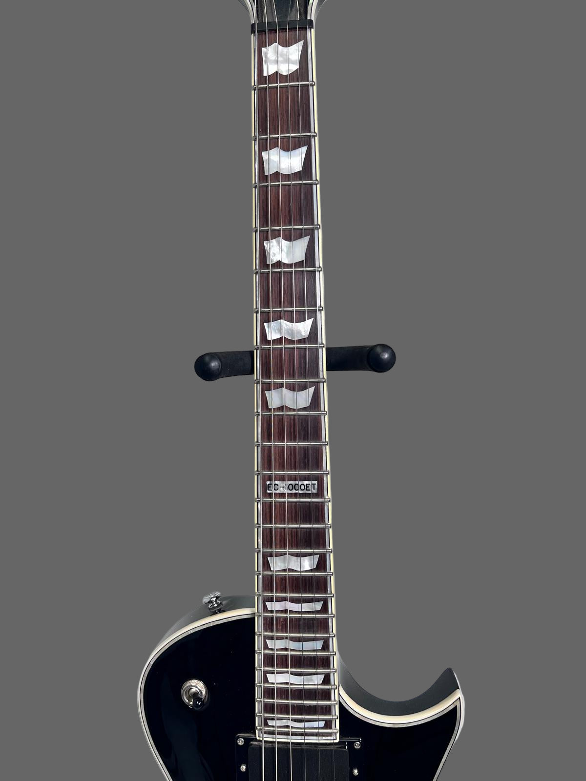 Used ESP LTD Deluxe w/evertune Bridge Black w Pearl Binding