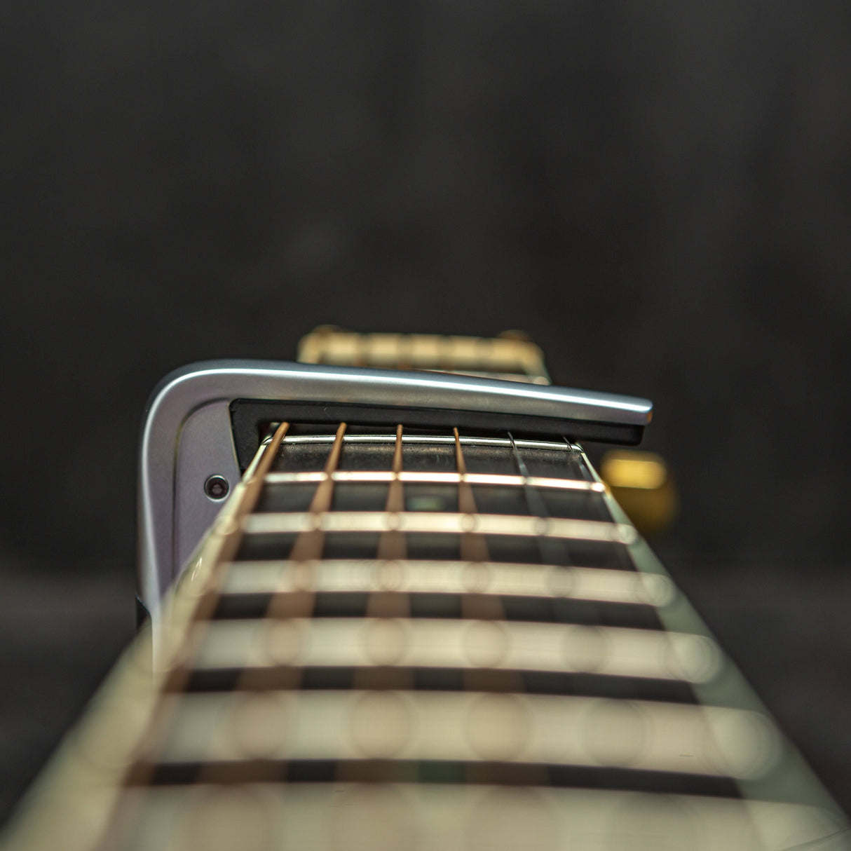 Dunlop Trigger Fly Curved Capo Satin Chrome