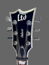 Used ESP LTD Deluxe w/evertune Bridge Black w Pearl Binding